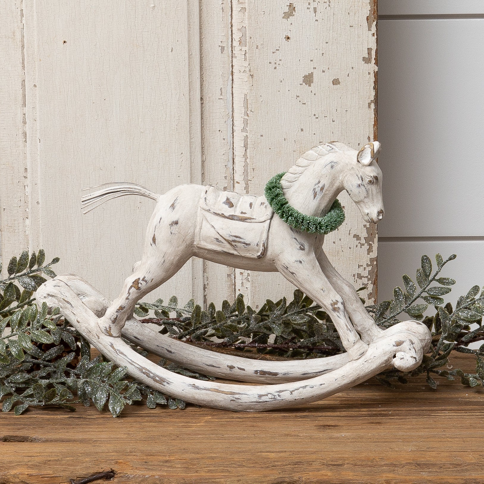 White Rocking Horse w/ Greens
